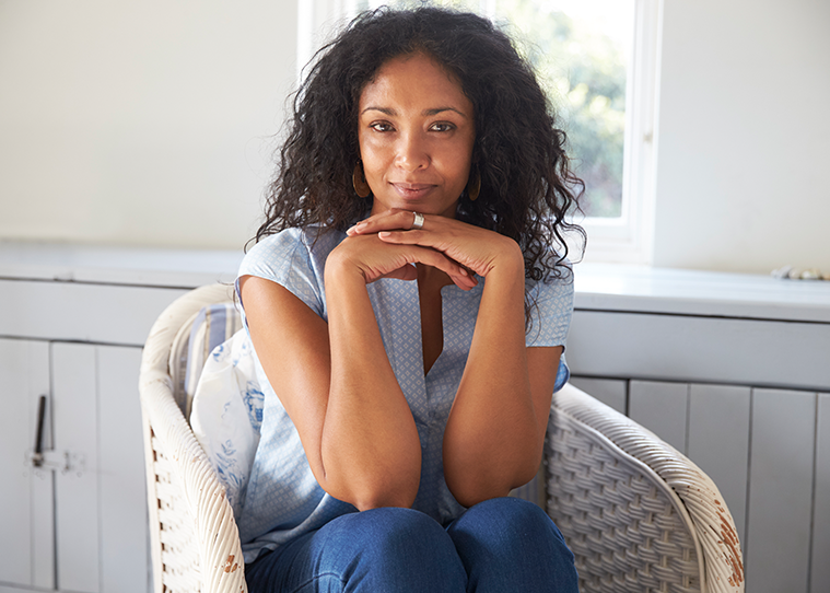 woman smiling slightly