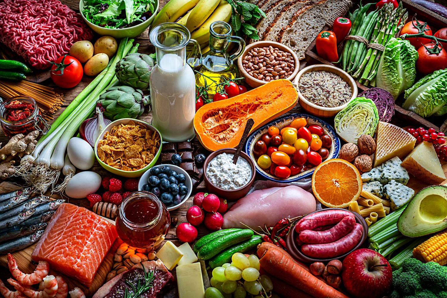 Aerial view of healthy foods that make up a balanced diet for good oral health